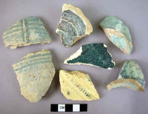 9 turquoise-glazed potsherds