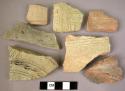 17 potsherds with incised decoration