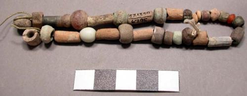 String of beads, miscellaneous, faience, carnelian, natrolite.