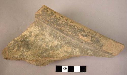 Potsherd - dark red-brown slip; thick coarse, straw-marked, wheel? made;