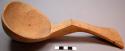 Unfinished wooden spoon