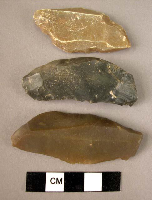 4 flint burins of various types showing heavy use as scrapers