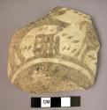 Baked clay bowl sherd