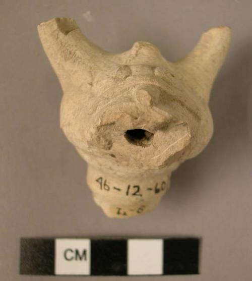 Baked clay zoomorphic spout