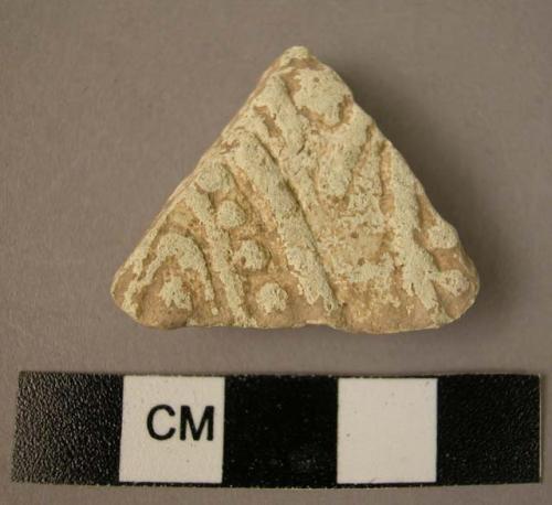 Ceramic body sherd, white ware, molded geometric design