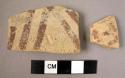 Ceramic body sherd, buff ware with red painted geometric design