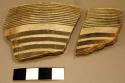 Sherds, black on white outside inside decoration