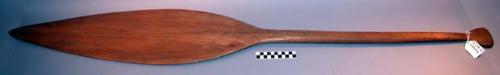 Short handled wooden paddle