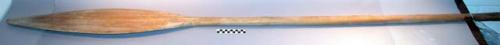 Long handled wooden paddle