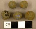 5 Stone balls & 1 stone fragment