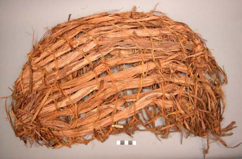 Cradle of cedar bark and grass