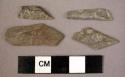 6 flint blades obliquely blunted at the pointed end