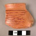 Rim potsherd - with reddish buff slip, burnished and painted