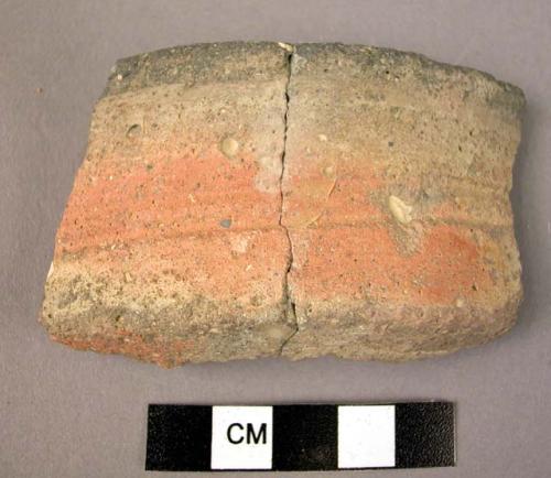 Ceramic  sherds, thick walled, red slipped ext. w. incised bands, black int.