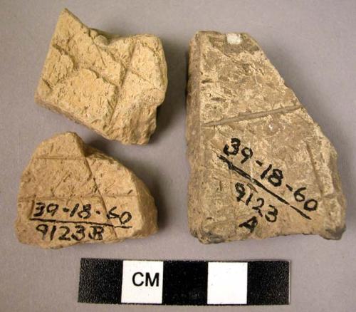 2 pre-Halaf incised potsherds (cf. Room 52)