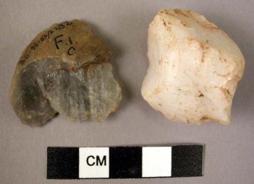 Quartzite chip; small worked quartzite nodule, human?; large quartzite pebble +