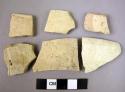 12 buff and green fine ware sherds
