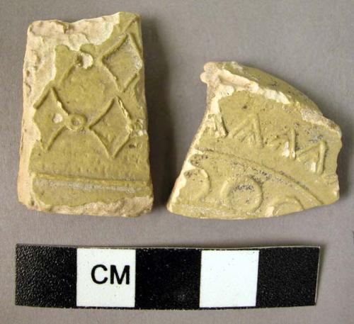 2 potsherds - yellow glaze; Samarra molded pottery ( rim & base sherd from same