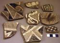 Ceramic rim and body sherds, black on white geometric designs