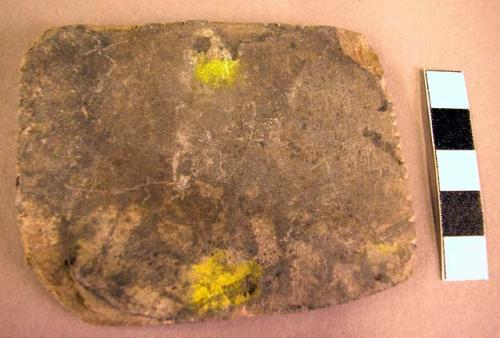 Stone tablet with yellow stains