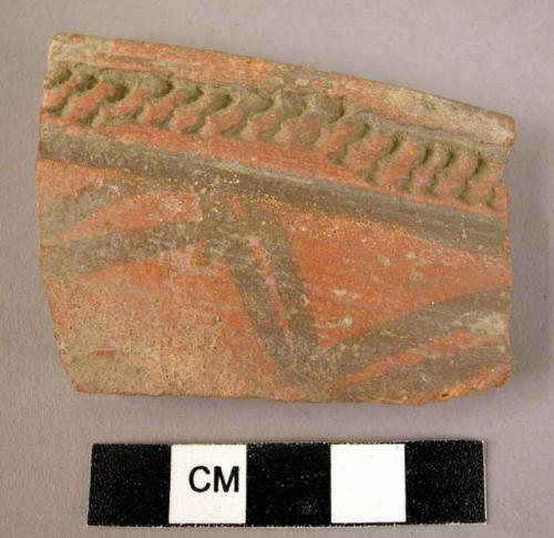 Rim potsherd - black on red relief (Type Series B3)