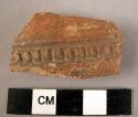 Potsherd - red , incised