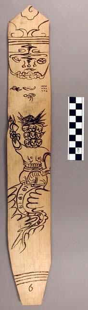 Ornament?, flat stick, black painted designs - human/zoomorph w/ 9 faces