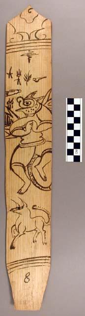 Ornament?, flat stick, black painted design - man/zoomorph & horned animal