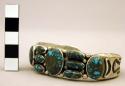 Cuff bracelet, heavy, narrow silver band with inlaid turquoise stones