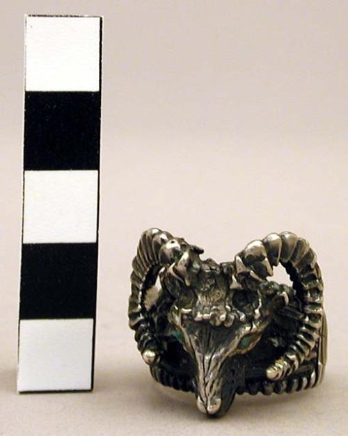 Ring, silver, cast ram's head, 2 turquoise chips for eyes