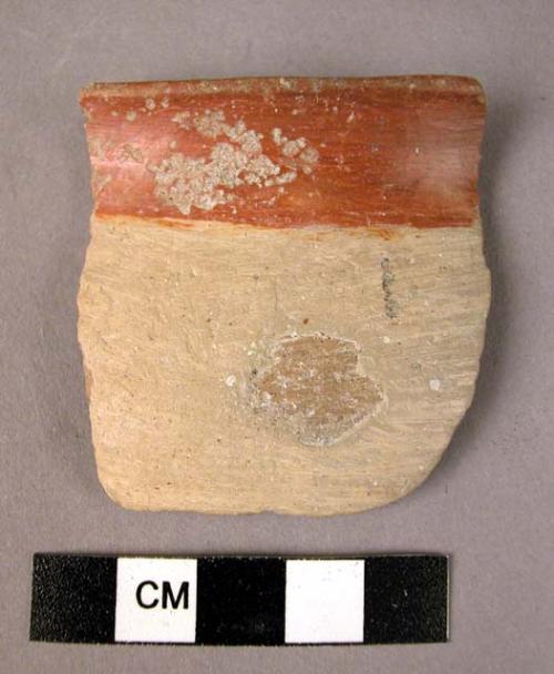 Rim potsherd - with inside slip running over rim