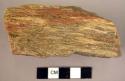 Small steep-ended hand adze of fossil wood