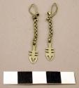 Pair of silver earrings, dangling on chains
