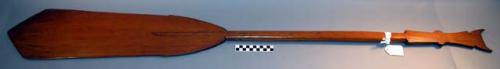 Wooden paddle with squared and pointed blade