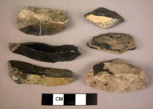 Large flint trimming flakes, some showing signs of use