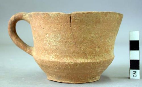 Pottery cup with spout