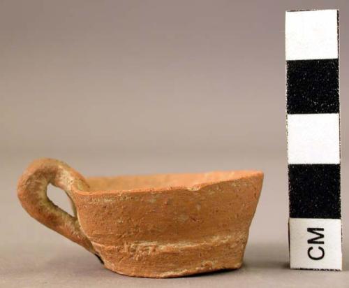 Miniature pottery cup