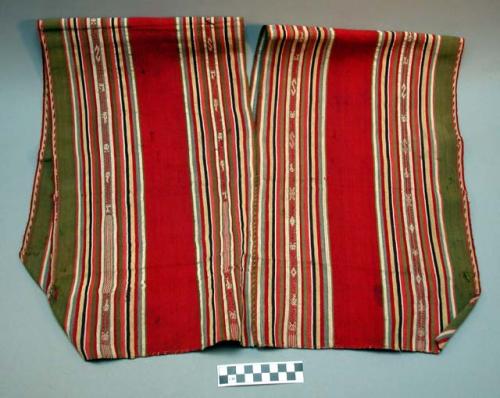 Child's poncho - old style; vegetable dyed; center red stripes others +