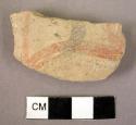Potsherd - "Red and black" ware base fragment with apparently naturalistic patte