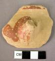Rim potsherd of red painted goblet or cylix with handle fragment