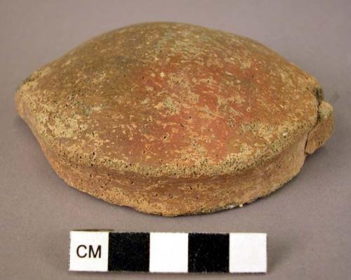 Ceramic bowl or lid, red polished ware, 2 perforated lug handles (broken), worn