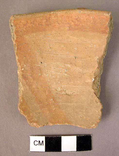 Rim potsherd with clay rivet on rim