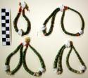 4 Navajo pendants. Strings of turquoise and shell beads. 3 of the pendants also
