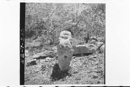 Serpent head with kneeling figure, Plaza N of Str Q162