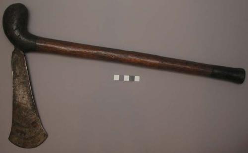 Ceremonial axe with wooden handle and decorated metal blade, 18.5" long