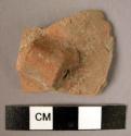 Ceramic body sherd, red ware, perforated cylindrical handle
