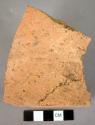 10 potsherds - red hand smoothed ware bases