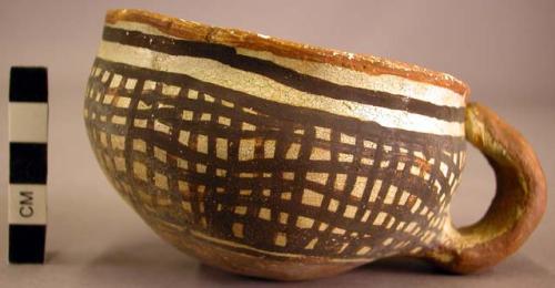 Cup, polacca polychrome style c. int: splatter design; ext: linear design. 5.6 x