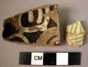2 base potsherds - brown and cream local ware