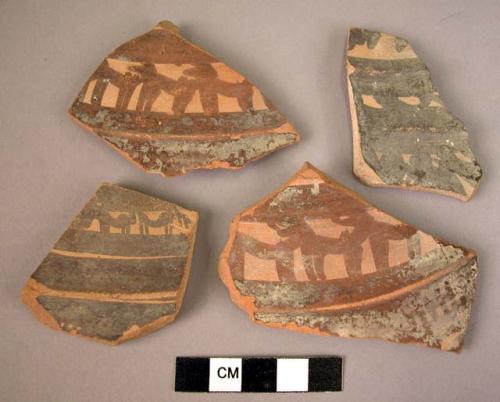 4 potsherds - painted and relief on light (A1)